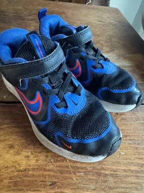 Nike Kids Blue and Black Sneakers with Red Accent